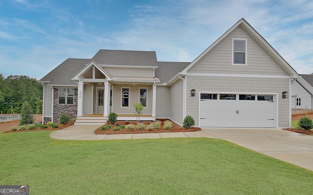 375 Werner Way, Senoia, GA 30276 - view of front of house with driveway, a front yard, a porch, a shingled roof, and an attached garage