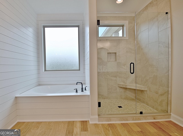 375 Werner Way, Senoia, GA 30276 - full bathroom featuring a bath, a shower stall, wood finished floors, and recessed lighting