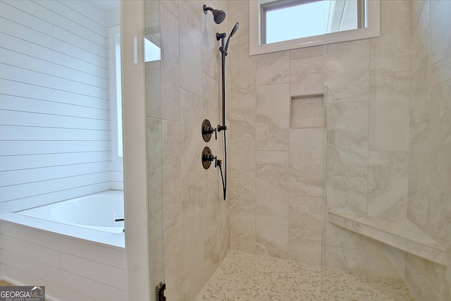 375 Werner Way, Senoia, GA 30276 - bathroom with tiled shower and a garden tub