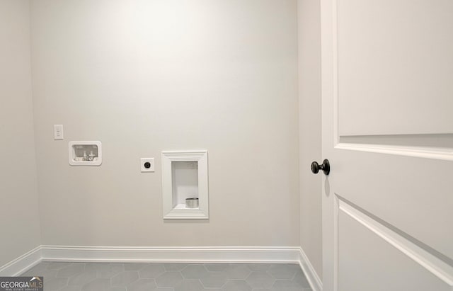 375 Werner Way, Senoia, GA 30276 - laundry room featuring electric dryer hookup, tile patterned flooring, and hookup for a washing machine
