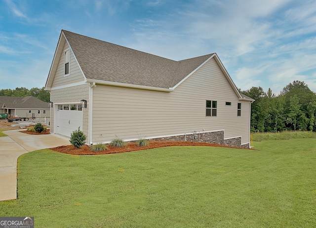 375 Werner Way, Senoia, GA 30276 - view of home's exterior with driveway, a lawn, and roof with shingles