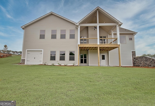 375 Werner Way, Senoia, GA 30276 - back of house with a lawn, a ceiling fan, and an attached garage