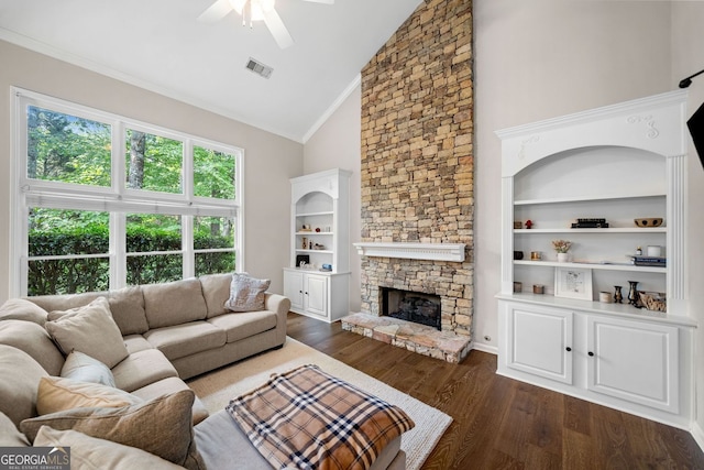 1205 Compass Pointe Xing, Alpharetta, GA 30005 - living room featuring ceiling fan, dark wood-type flooring, a stone fireplace, crown molding, and high vaulted ceiling