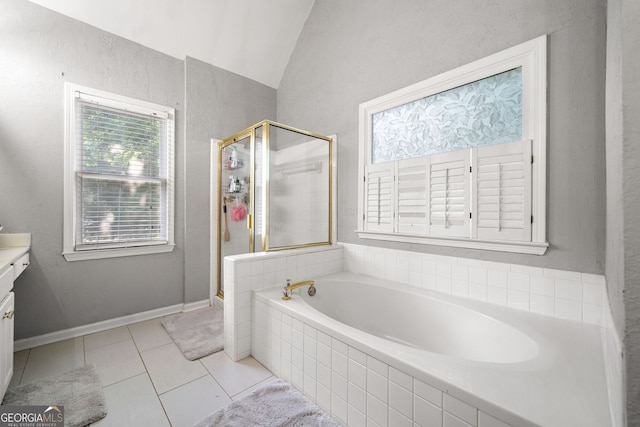 1205 Compass Pointe Xing, Alpharetta, GA 30005 - bathroom featuring vanity, a shower stall, a garden tub, lofted ceiling, and tile patterned floors
