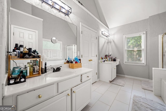 1205 Compass Pointe Xing, Alpharetta, GA 30005 - bathroom with vaulted ceiling, vanity, a shower, and tile patterned flooring