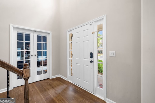 1205 Compass Pointe Xing, Alpharetta, GA 30005 - foyer featuring french doors, dark wood finished floors, and baseboards