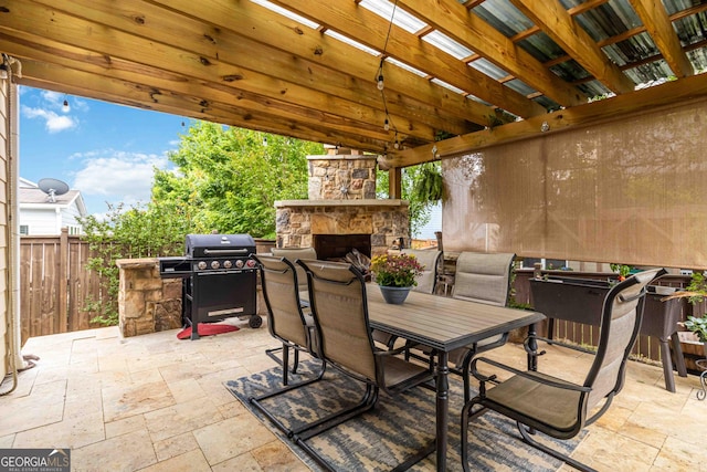 441 Spring View Dr, Woodstock, GA 30188 - view of patio / terrace with an outdoor stone fireplace, area for grilling, and outdoor dining space