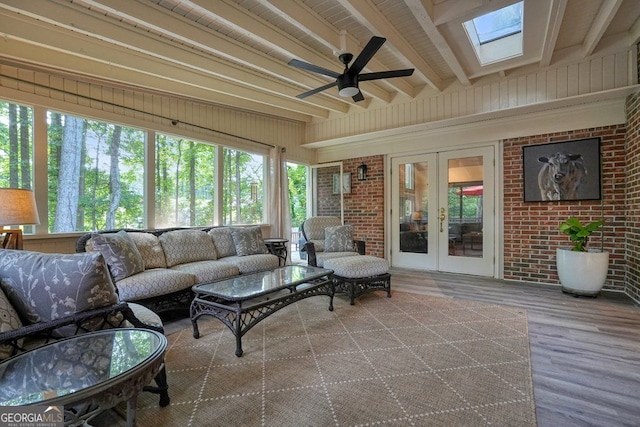 11940 Mountain Laurel Dr, Roswell, GA 30075 - sunroom with french doors, a skylight, ceiling fan, and beam ceiling