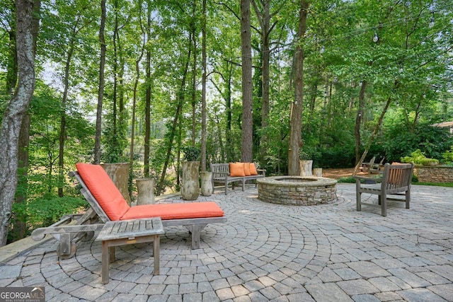 11940 Mountain Laurel Dr, Roswell, GA 30075 - view of patio / terrace featuring an outdoor fire pit