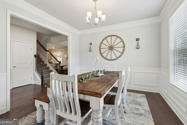 836 Hawkins Creek Dr, Jefferson, GA 30549 - dining space with a chandelier, wood finished floors, stairs, a wainscoted wall, and ornamental molding