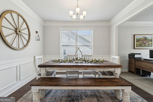 836 Hawkins Creek Dr, Jefferson, GA 30549 - dining room featuring a chandelier, ornamental molding, a wainscoted wall, and a decorative wall
