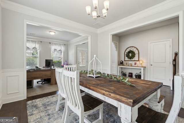 836 Hawkins Creek Dr, Jefferson, GA 30549 - dining room featuring a chandelier, wood finished floors, a wainscoted wall, an office area, and crown molding