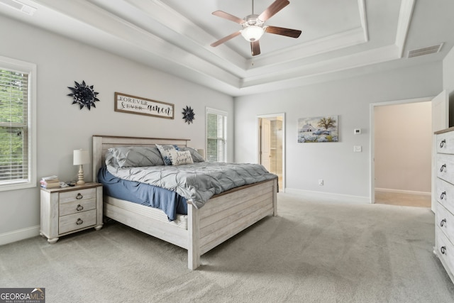 836 Hawkins Creek Dr, Jefferson, GA 30549 - bedroom featuring a tray ceiling, light colored carpet, connected bathroom, and a ceiling fan