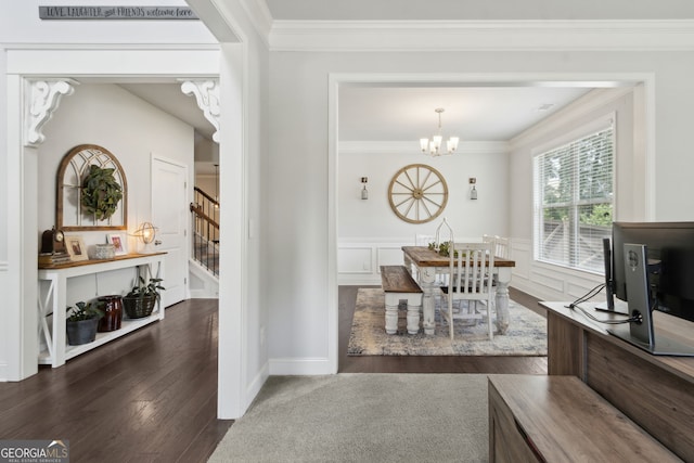 836 Hawkins Creek Dr, Jefferson, GA 30549 - entryway featuring stairs, a chandelier, crown molding, dark wood-style floors, and wainscoting