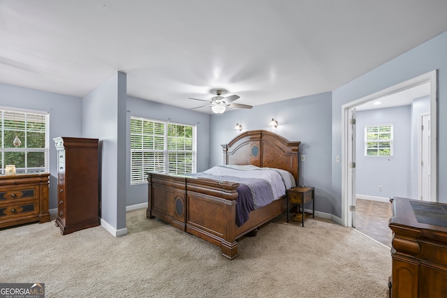 136 Wedgewood Dr, Danielsville, GA 30633 - carpeted bedroom featuring multiple windows and a ceiling fan
