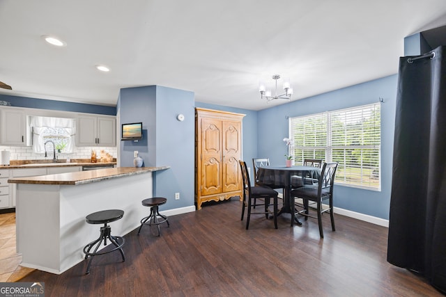 136 Wedgewood Dr, Danielsville, GA 30633 - dining room featuring a chandelier, dark wood finished floors, and recessed lighting