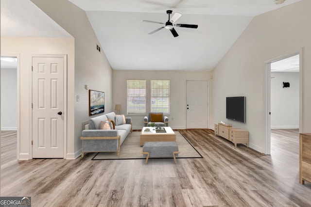 85 Prestigious Pl, Senoia, GA 30276 - living room with ceiling fan, high vaulted ceiling, wood finished floors, and baseboards