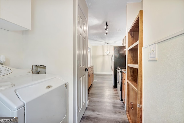 85 Prestigious Pl, Senoia, GA 30276 - laundry area with washer / dryer and wood finished floors