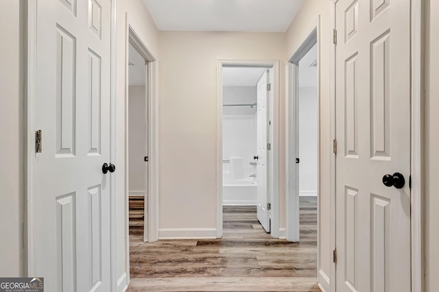 85 Prestigious Pl, Senoia, GA 30276 - hallway featuring light wood finished floors and baseboards