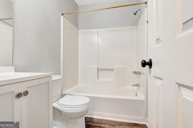 85 Prestigious Pl, Senoia, GA 30276 - bathroom featuring toilet, vanity, tub / shower combination, and wood finished floors