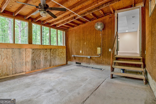 85 Prestigious Pl, Senoia, GA 30276 - miscellaneous room with concrete flooring, ceiling fan, and wood walls