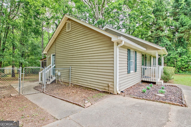 85 Prestigious Pl, Senoia, GA 30276 - view of property exterior with a gate