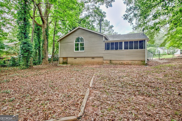 85 Prestigious Pl, Senoia, GA 30276 - rear view of house featuring crawl space and a sunroom