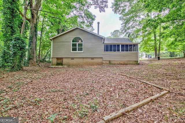 85 Prestigious Pl, Senoia, GA 30276 - rear view of house featuring crawl space and a sunroom