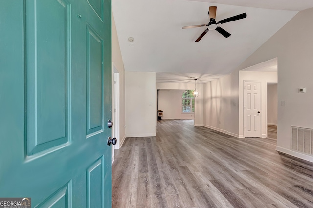 85 Prestigious Pl, Senoia, GA 30276 - foyer entrance with wood finished floors, lofted ceiling, baseboards, and ceiling fan