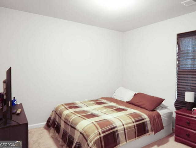 20 Sloane Ct Unit 64, Covington, GA 30016 - bedroom with light colored carpet and baseboards