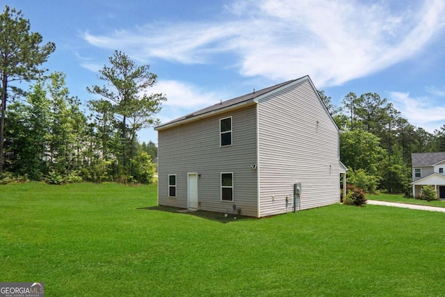 20 Sloane Ct Unit 64, Covington, GA 30016 - view of property exterior featuring a lawn