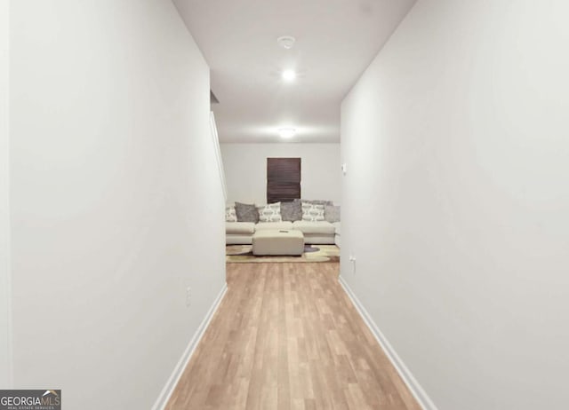 20 Sloane Ct Unit 64, Covington, GA 30016 - hall with light wood-style floors and baseboards