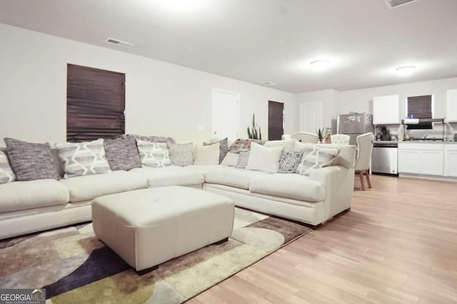 20 Sloane Ct Unit 64, Covington, GA 30016 - living area featuring light wood-style flooring