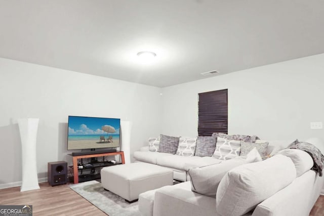 20 Sloane Ct Unit 64, Covington, GA 30016 - living area with wood finished floors and baseboards