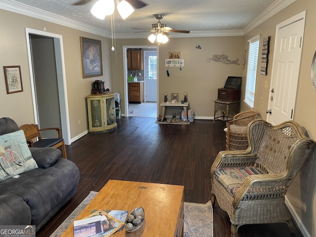 501 Lakeshore Dr, Monticello, GA 31064 - living area with a ceiling fan, wood finished floors, baseboards, and ornamental molding