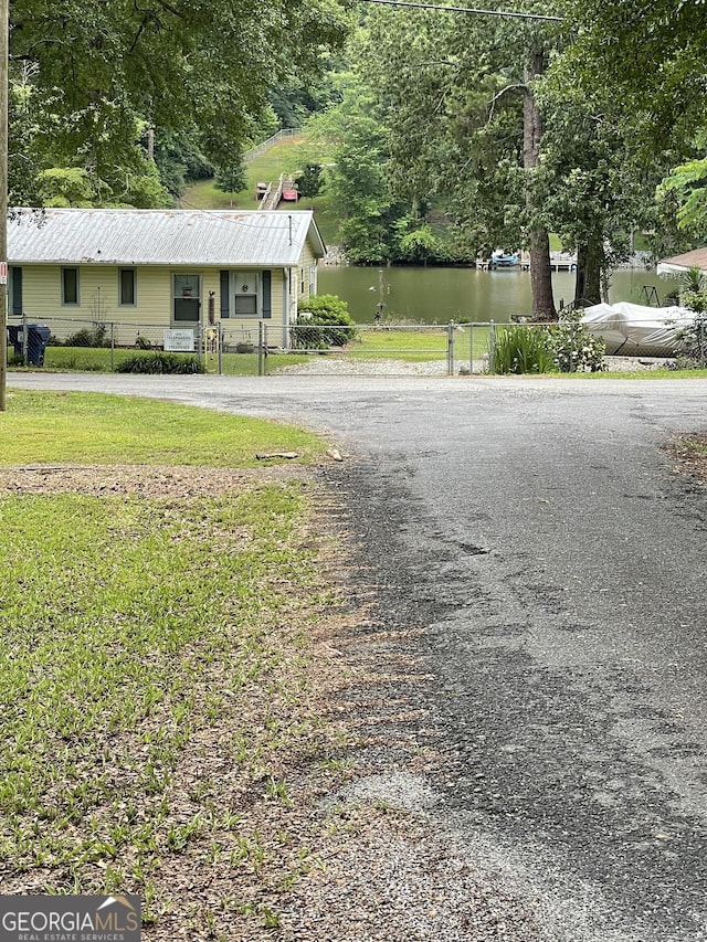 501 Lakeshore Dr, Monticello, GA 31064 - view of asphalt street with a water view