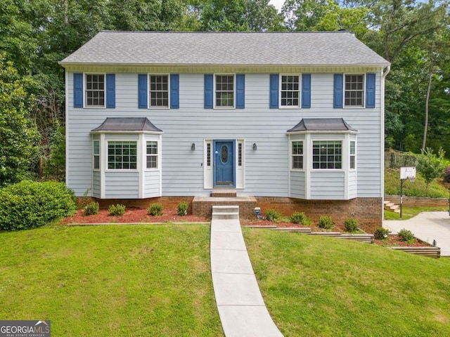 4197 Chadds Xing, Marietta, GA 30062 - colonial home featuring a front yard and roof with shingles