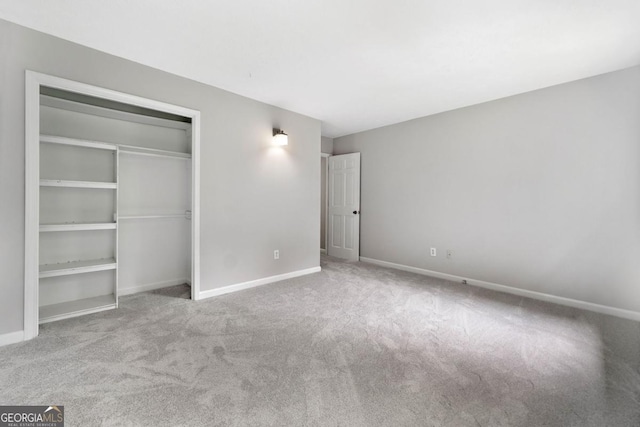 4197 Chadds Xing, Marietta, GA 30062 - unfurnished bedroom featuring carpet floors, baseboards, and a closet