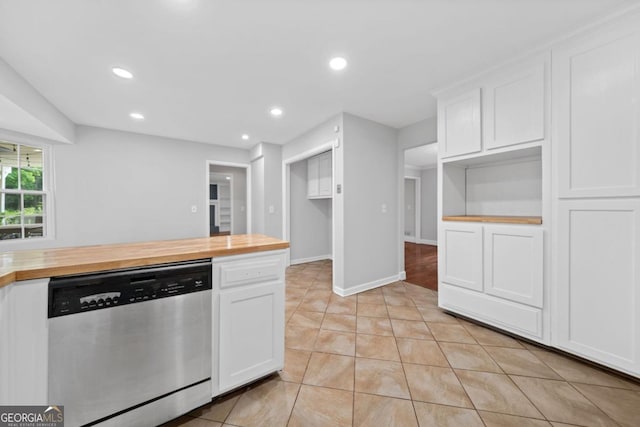 4197 Chadds Xing, Marietta, GA 30062 - kitchen with stainless steel dishwasher, wood counters, white cabinetry, light tile patterned flooring, and recessed lighting