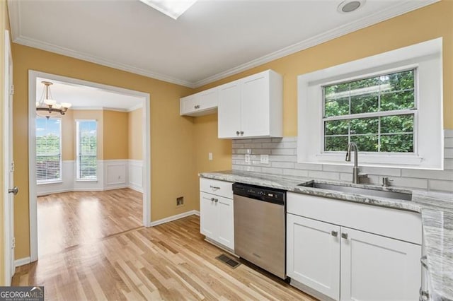 12290 Greenmont Walk, Alpharetta, GA 30009 - kitchen featuring stainless steel dishwasher, crown molding, a sink, light wood finished floors, and light stone counters
