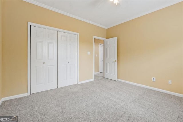 12290 Greenmont Walk, Alpharetta, GA 30009 - unfurnished bedroom with carpet floors, crown molding, baseboards, a closet, and ceiling fan