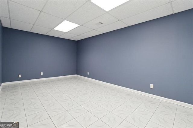 12290 Greenmont Walk, Alpharetta, GA 30009 - spare room with a paneled ceiling and baseboards