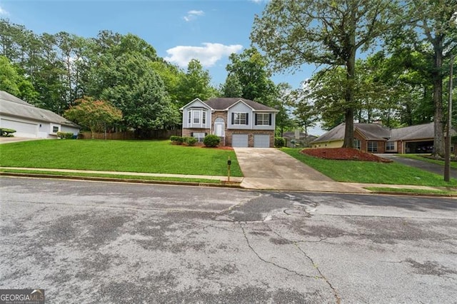 12290 Greenmont Walk, Alpharetta, GA 30009 - bi-level home featuring driveway, a front lawn, and a garage