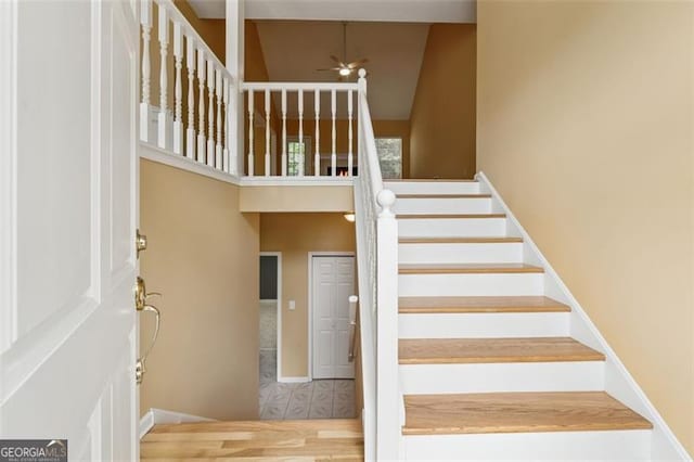 12290 Greenmont Walk, Alpharetta, GA 30009 - stairs featuring ceiling fan and wood finished floors