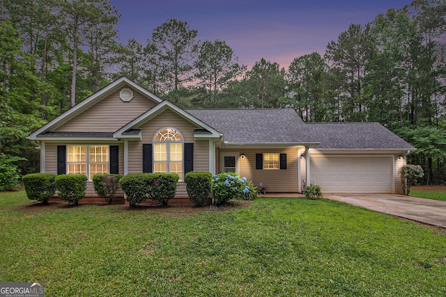 325 Leonard Rd, Lagrange, GA 30241 - ranch-style home with an attached garage, concrete driveway, a yard, and roof with shingles