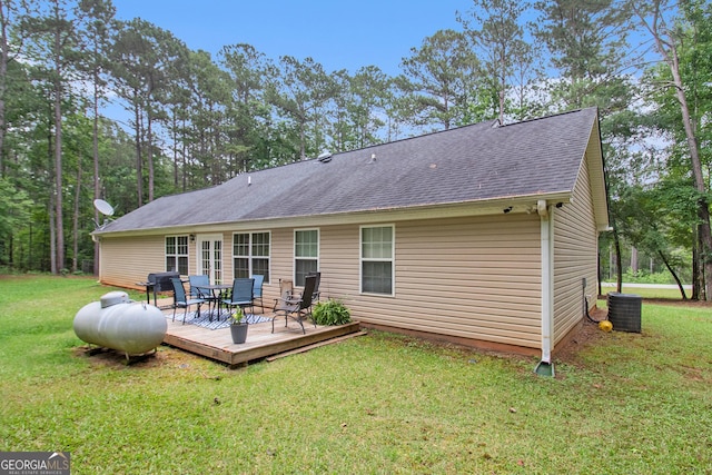 325 Leonard Rd, Lagrange, GA 30241 - rear view of house featuring a wooden deck, a shingled roof, a yard, and cooling unit