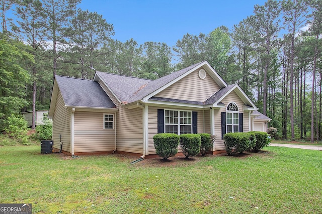 325 Leonard Rd, Lagrange, GA 30241 - view of front facade with roof with shingles, a front yard, cooling unit, and an attached garage