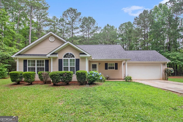 325 Leonard Rd, Lagrange, GA 30241 - ranch-style home with a garage, driveway, a front lawn, and roof with shingles
