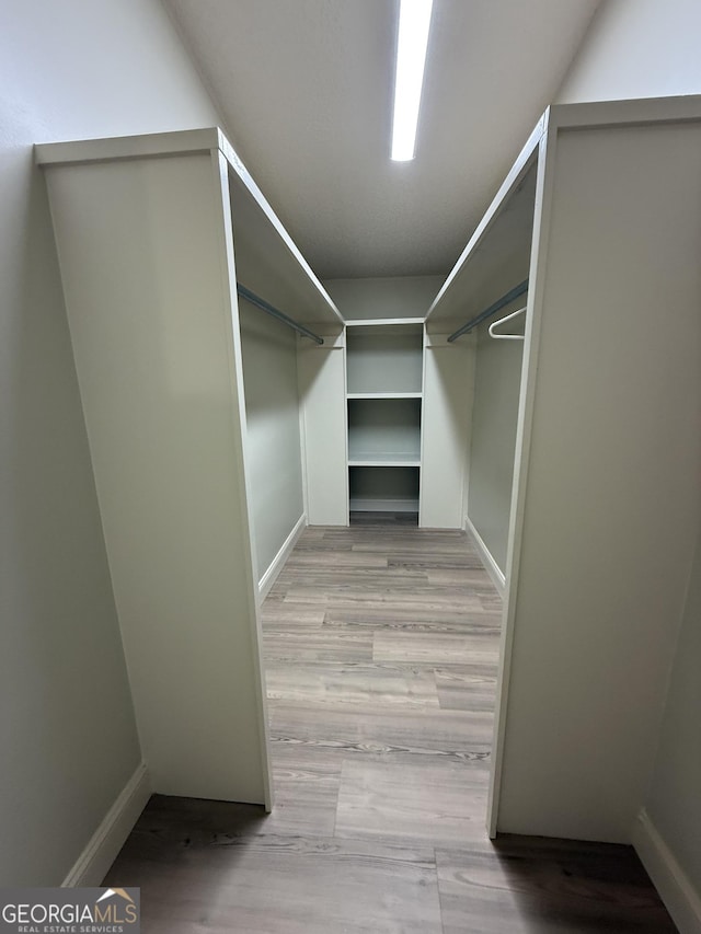 179 Creek Ridge Rd, Claxton, GA 30417 - walk in closet featuring light wood finished floors