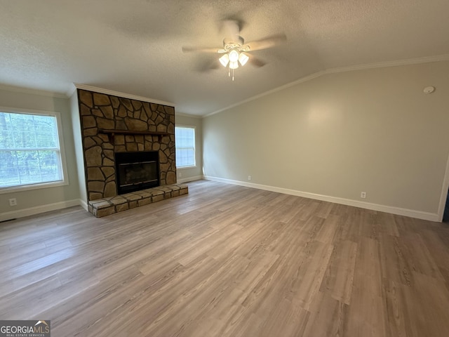 179 Creek Ridge Rd, Claxton, GA 30417 - unfurnished living room with crown molding, a textured ceiling, ceiling fan, wood finished floors, and baseboards